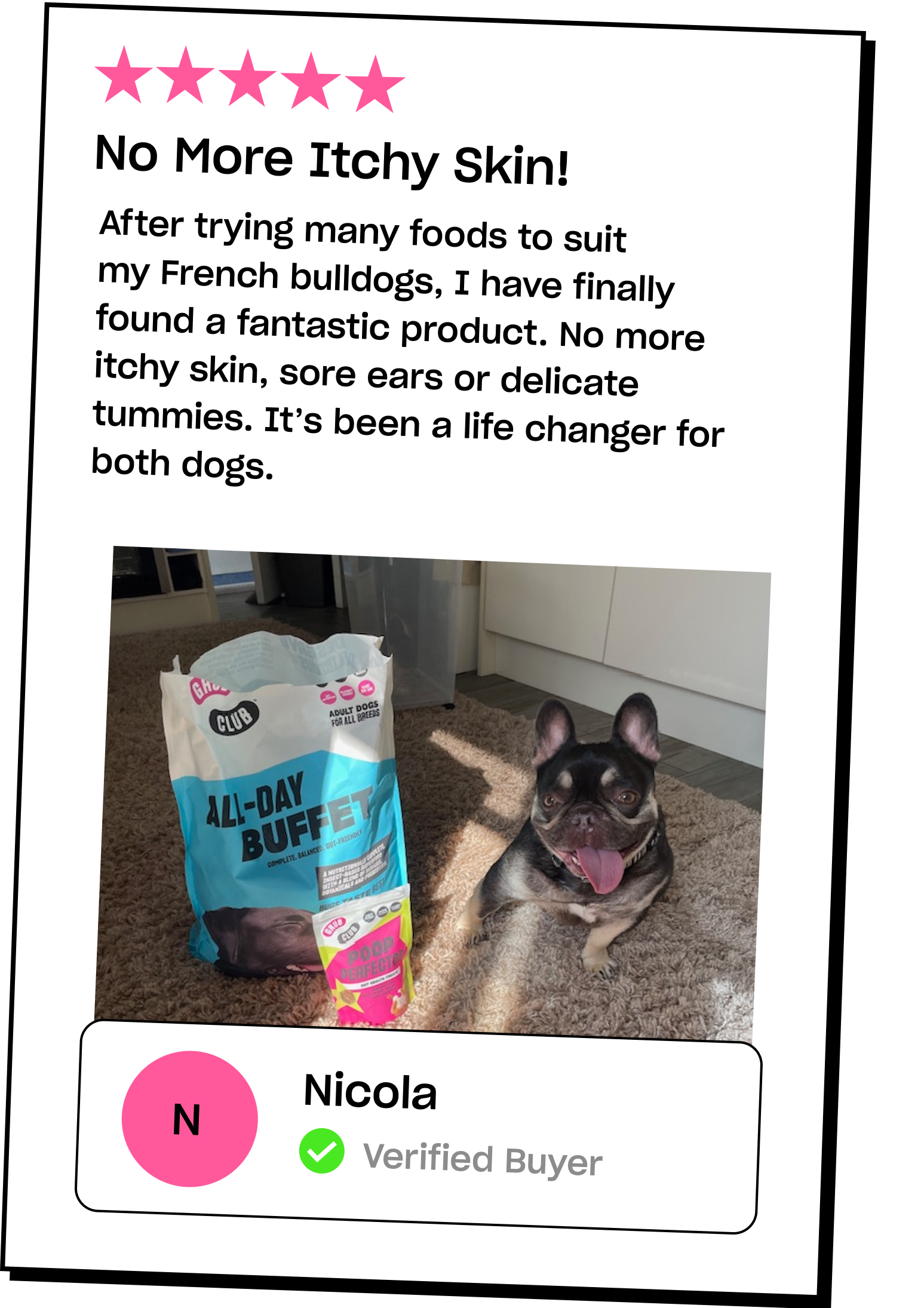 French bulldog sitting beside a bag of dog food.