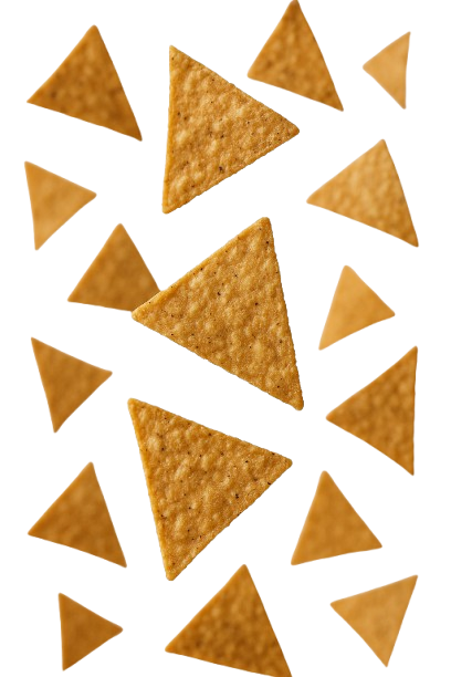 Scattered triangular tortilla chips on a white background.