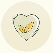 An icon of a light green heart with two yellow leaves inside, on a cream-colored circular background.