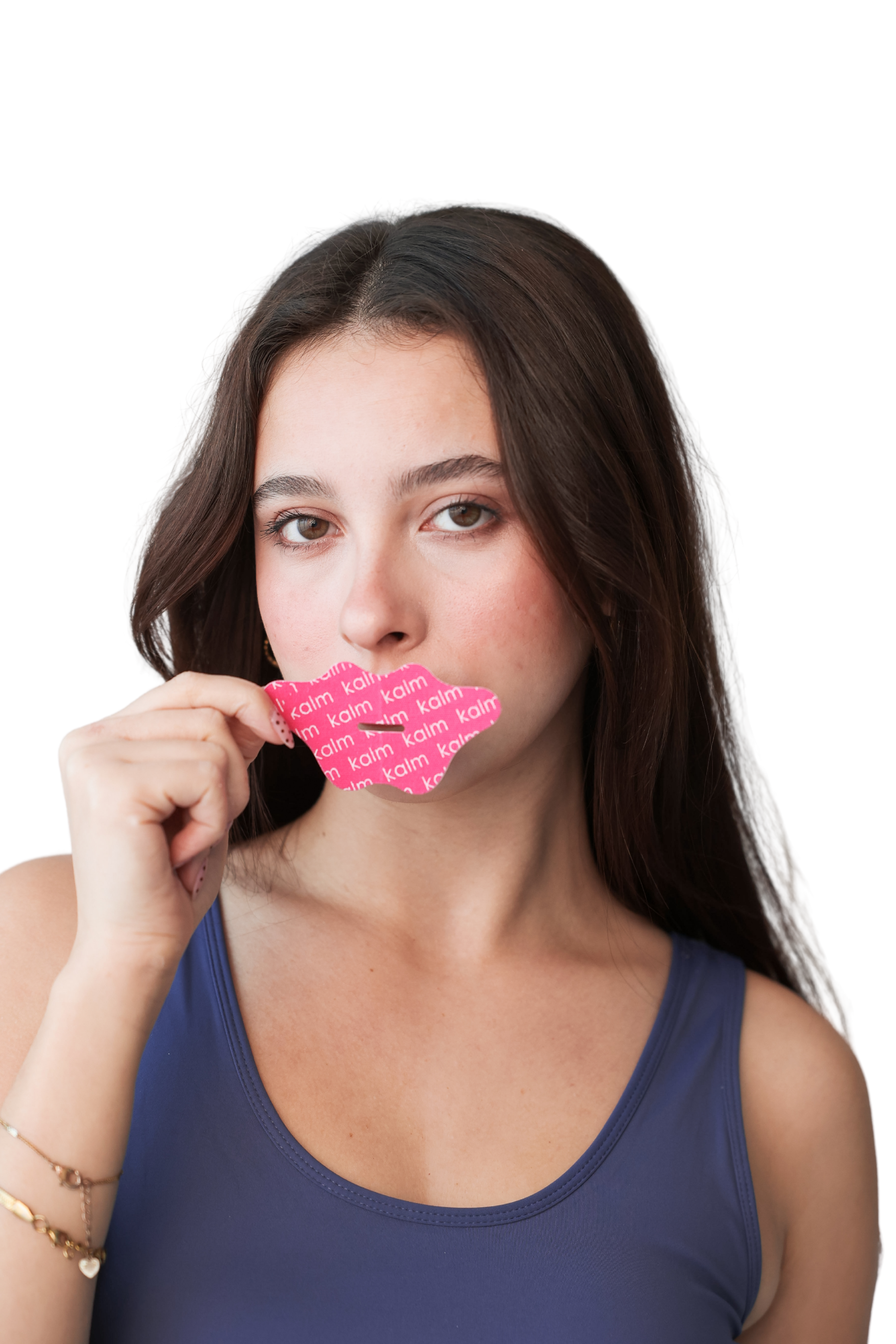 Woman holding pink lip-shaped sticker with 'kalm' text.