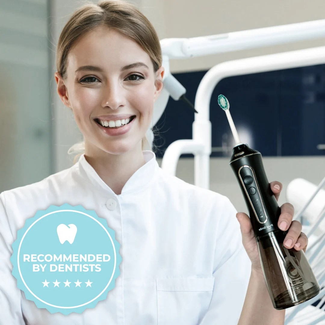 Person in a dental office holding an electric toothbrush, featuring a 'recommended by dentists' badge.