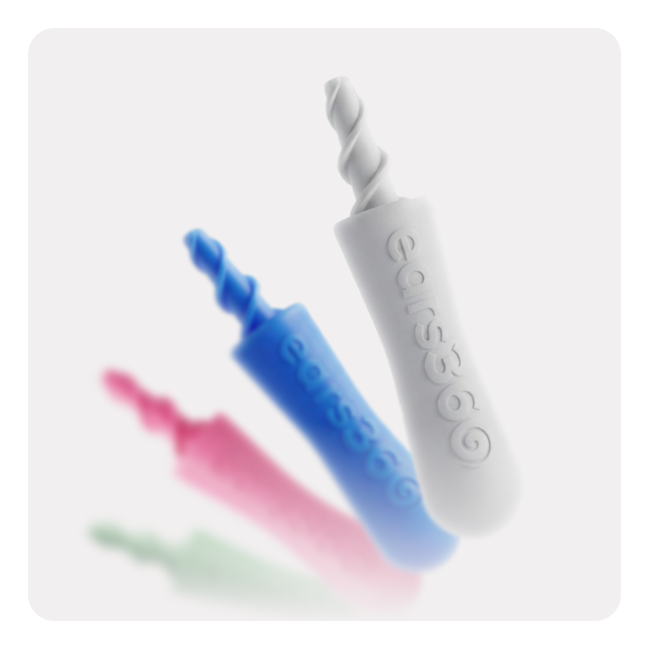Several colorful 'ears360' reusable ear cleaners with spiral tips, shown against a white background with shallow focus.