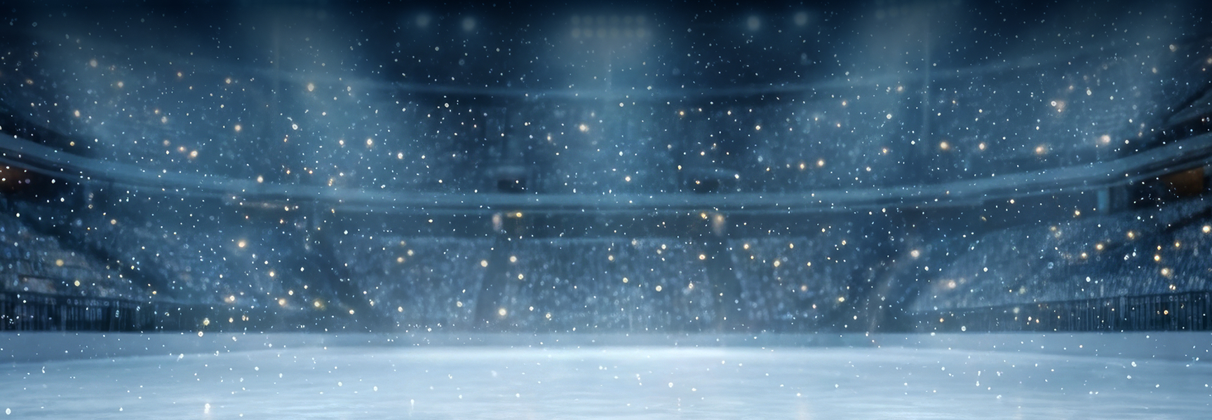 An empty outdoor ice hockey rink at night with snow falling under bright stadium lights.