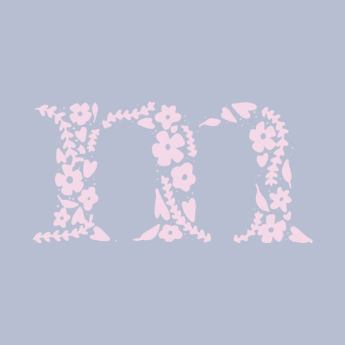 Floral letter 'm' design on a gray background.