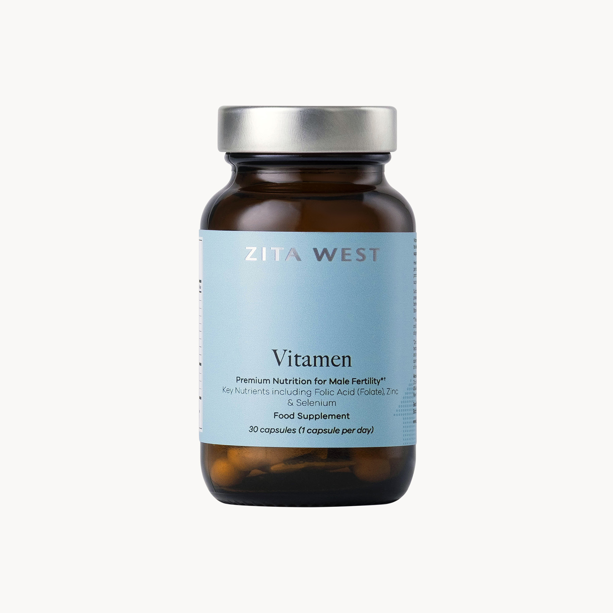 A brown glass bottle of Zita West Vitafem food supplement against a white background.