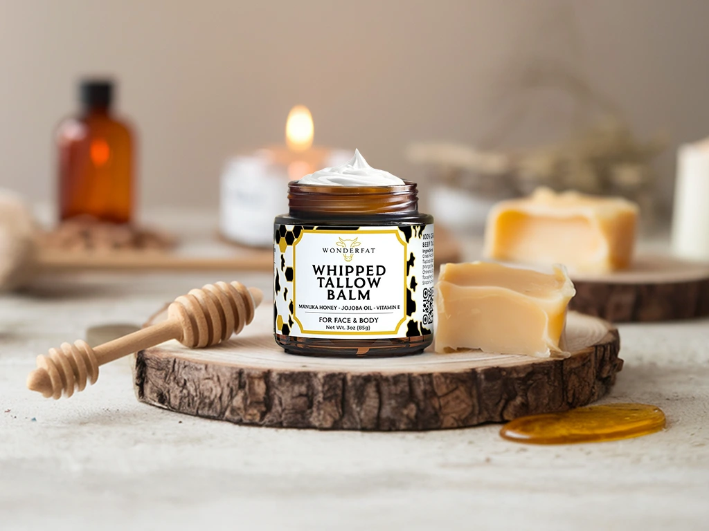 Jar of Wonderfat Whipped Tallow Balm with Manuka Honey, jojoba oil, and vitamin E—natural skincare for face and body.
