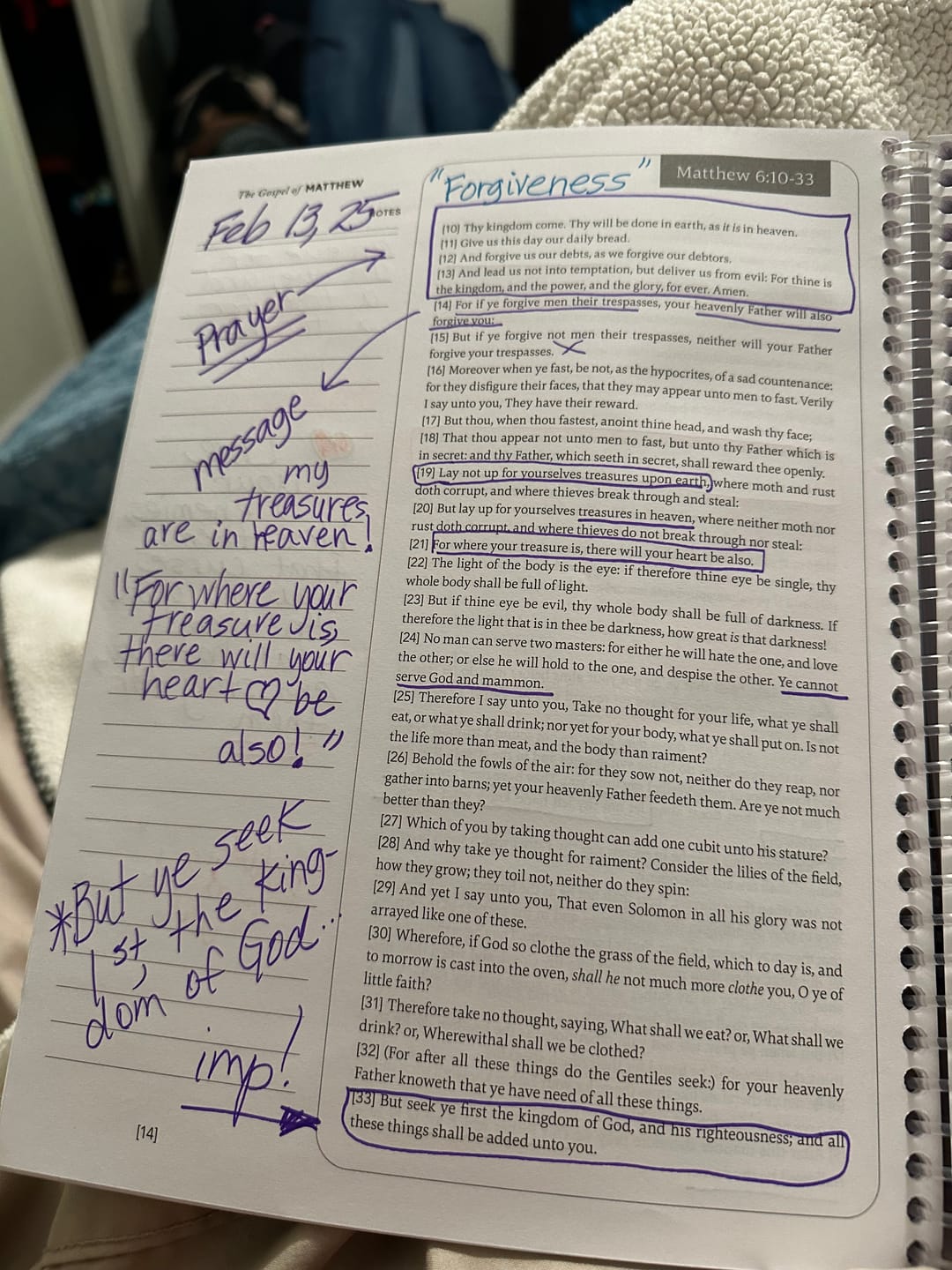 Open notebook with handwritten notes and highlighted Bible verses.