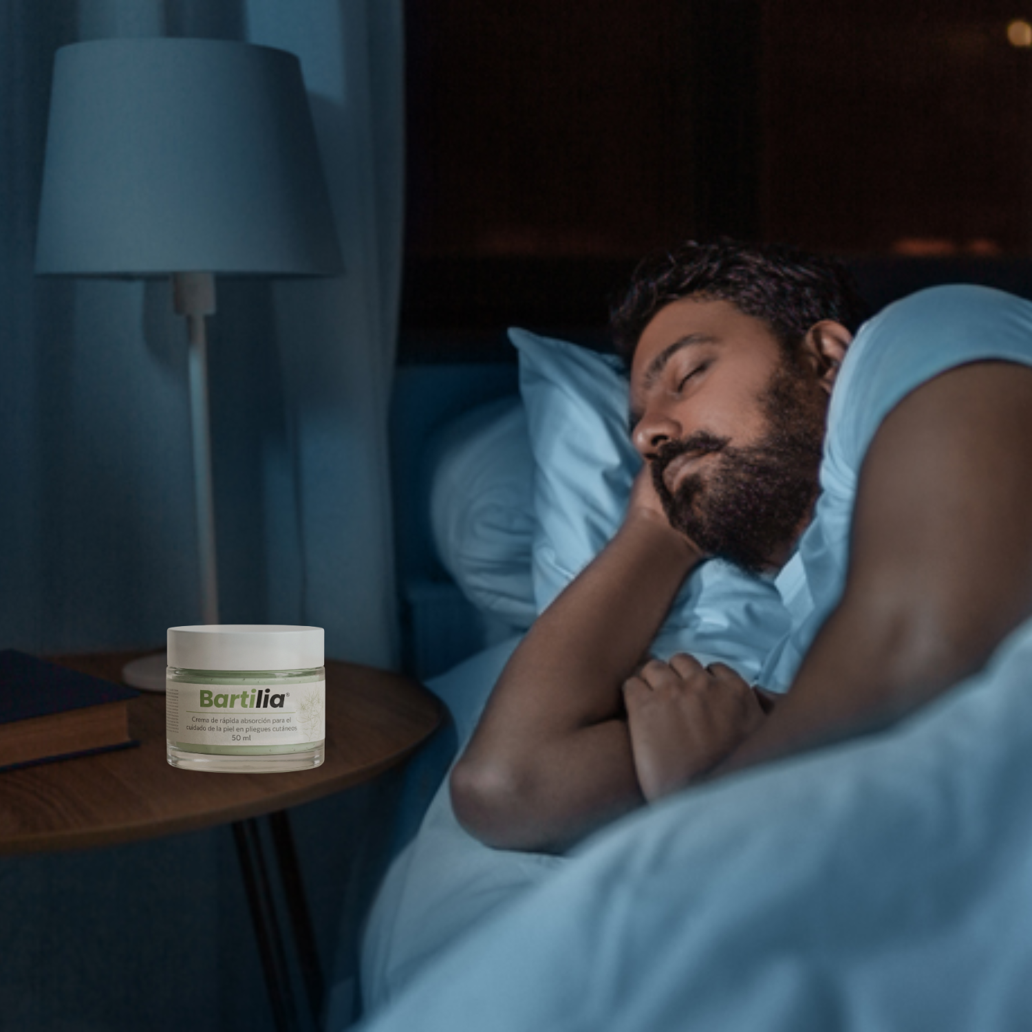 A man sleeps peacefully in bed with a jar of Bartilia cream on the nightstand next to him.