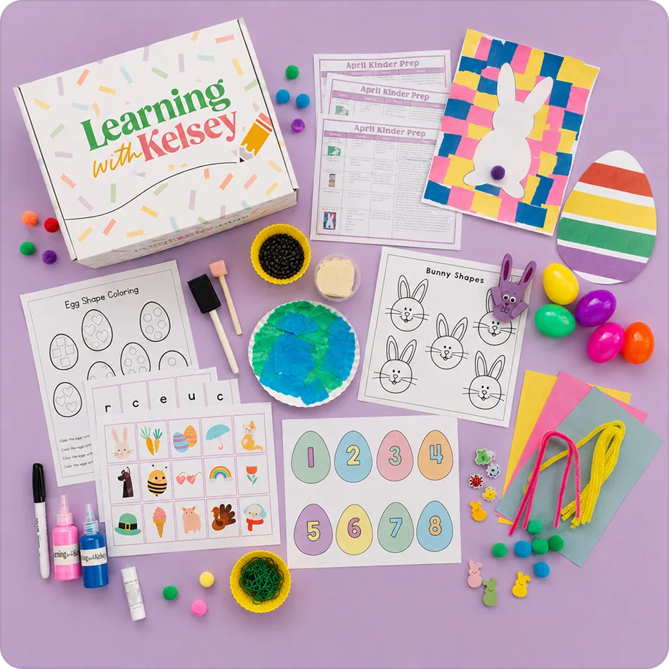 An overhead shot of a 'Learning with Kelsey' children's activity box with its contents displayed on a purple surface.