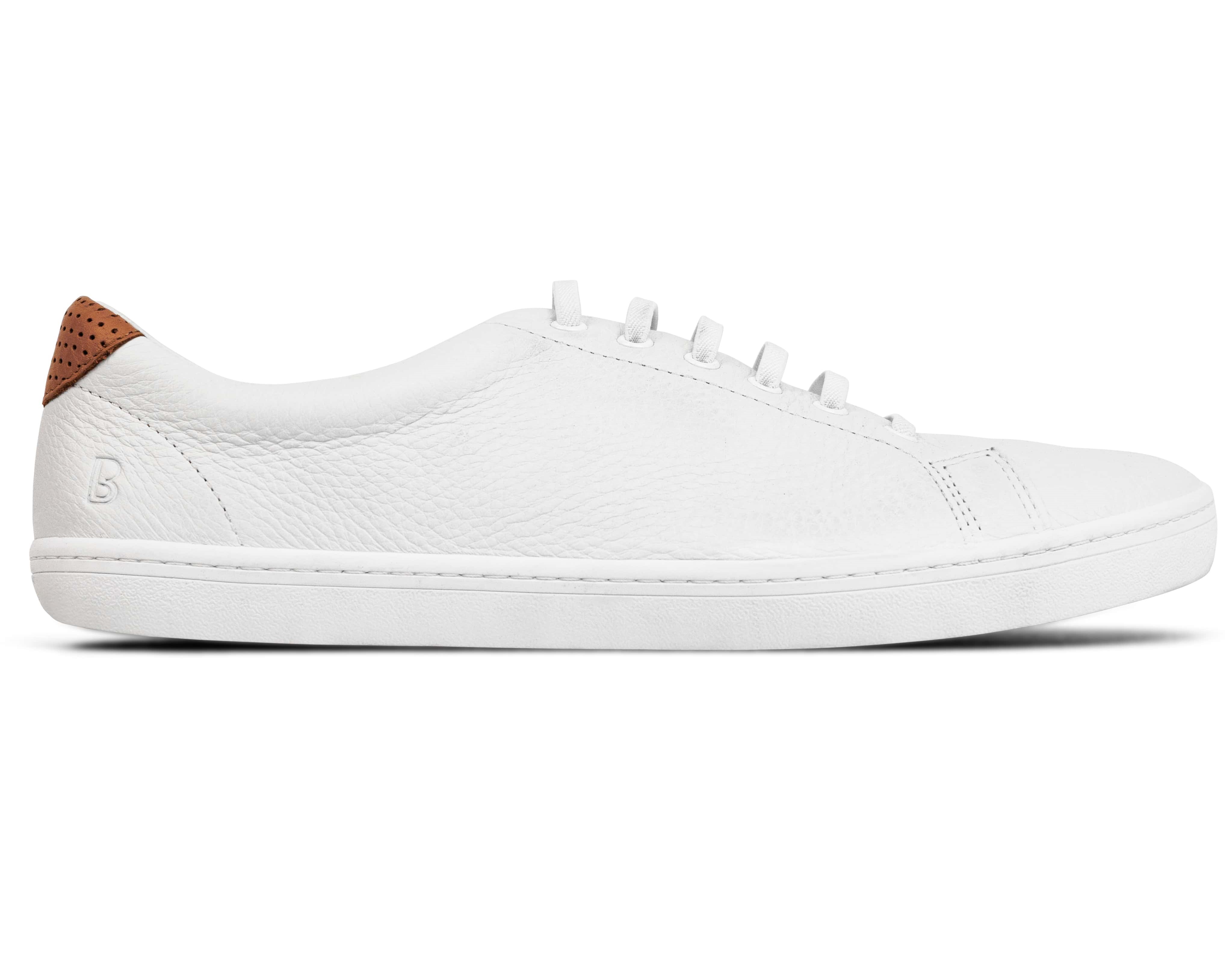 White leather sneaker with brown heel accent, side view.
