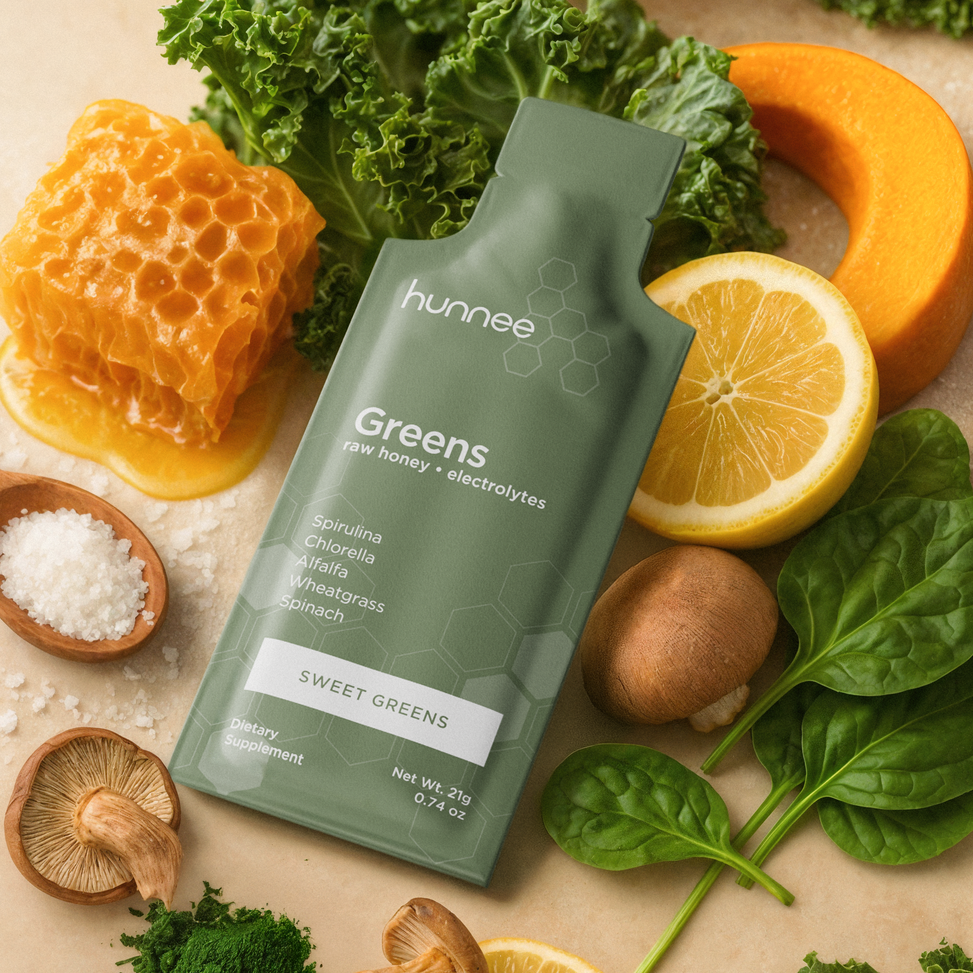 Packet of greens with honeycomb, lemon, kale, mushrooms, and spinach.